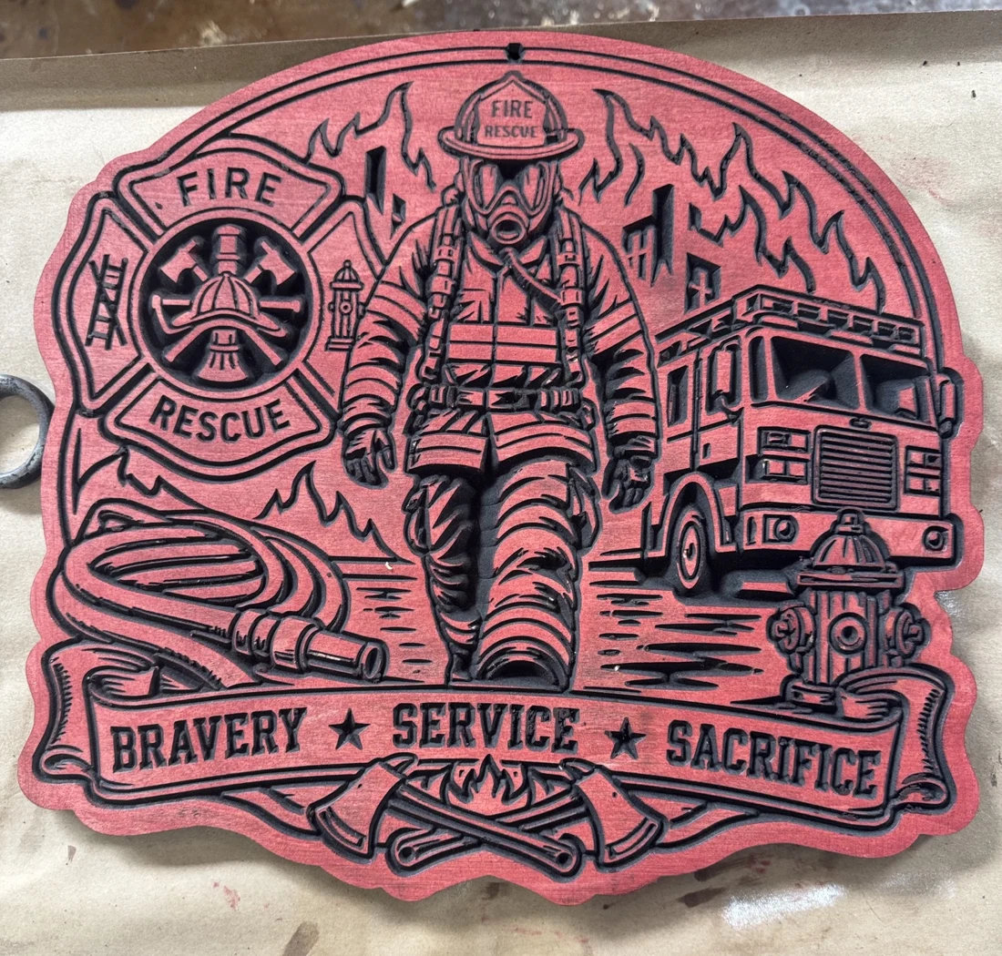 Red firefighter tribute sign